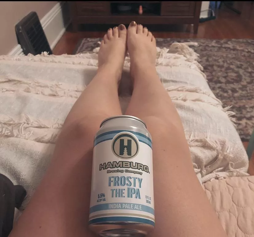 An IPA and cute little bare naked toes