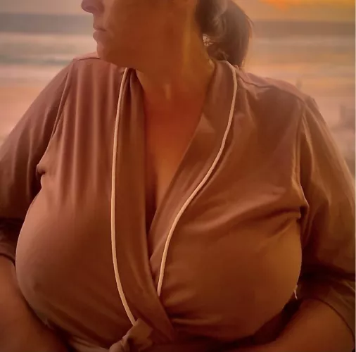 At the beach, waiting for someone to notice this 40yr old milf