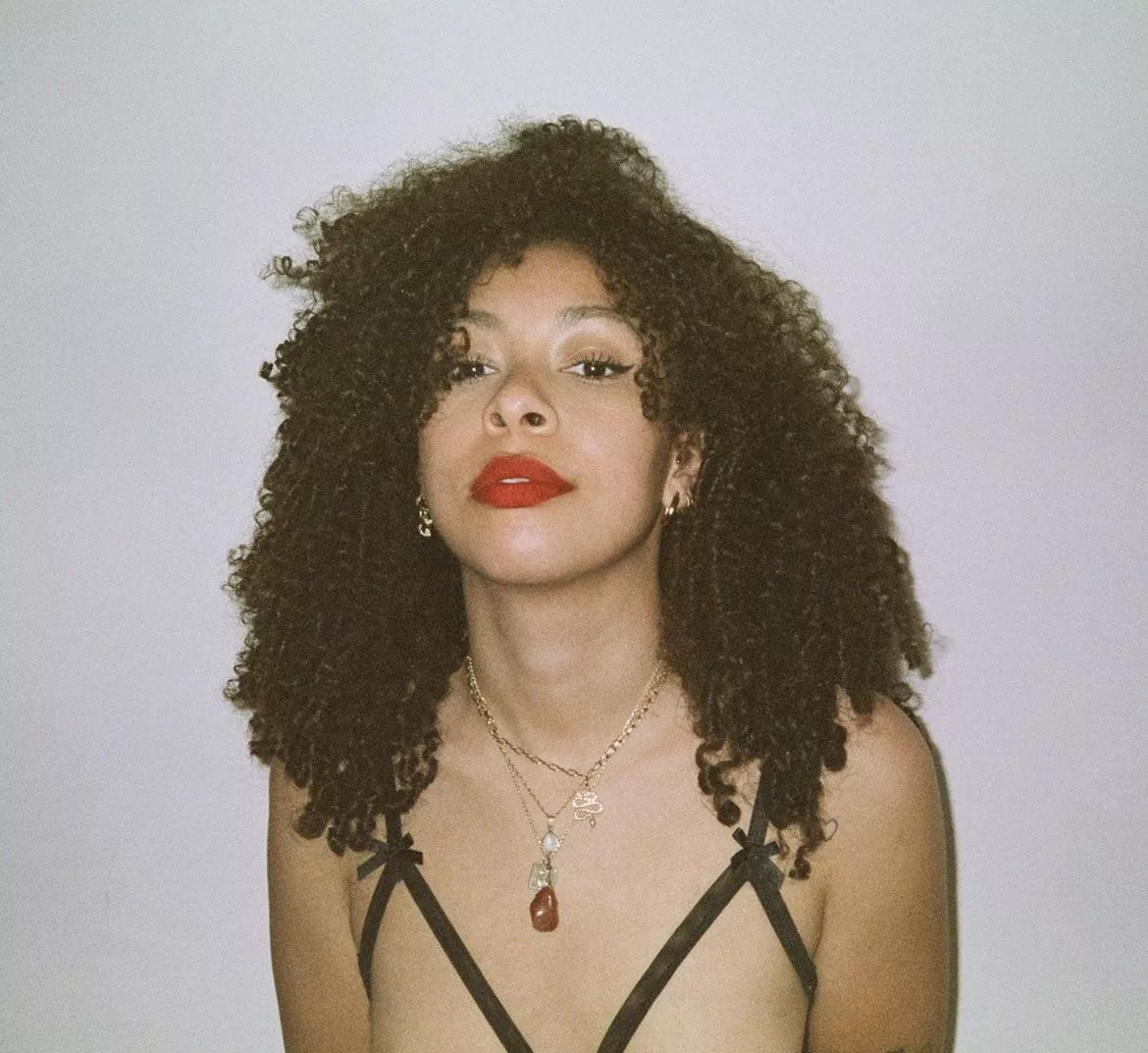 Curly girl on film. Do you like analog photography?