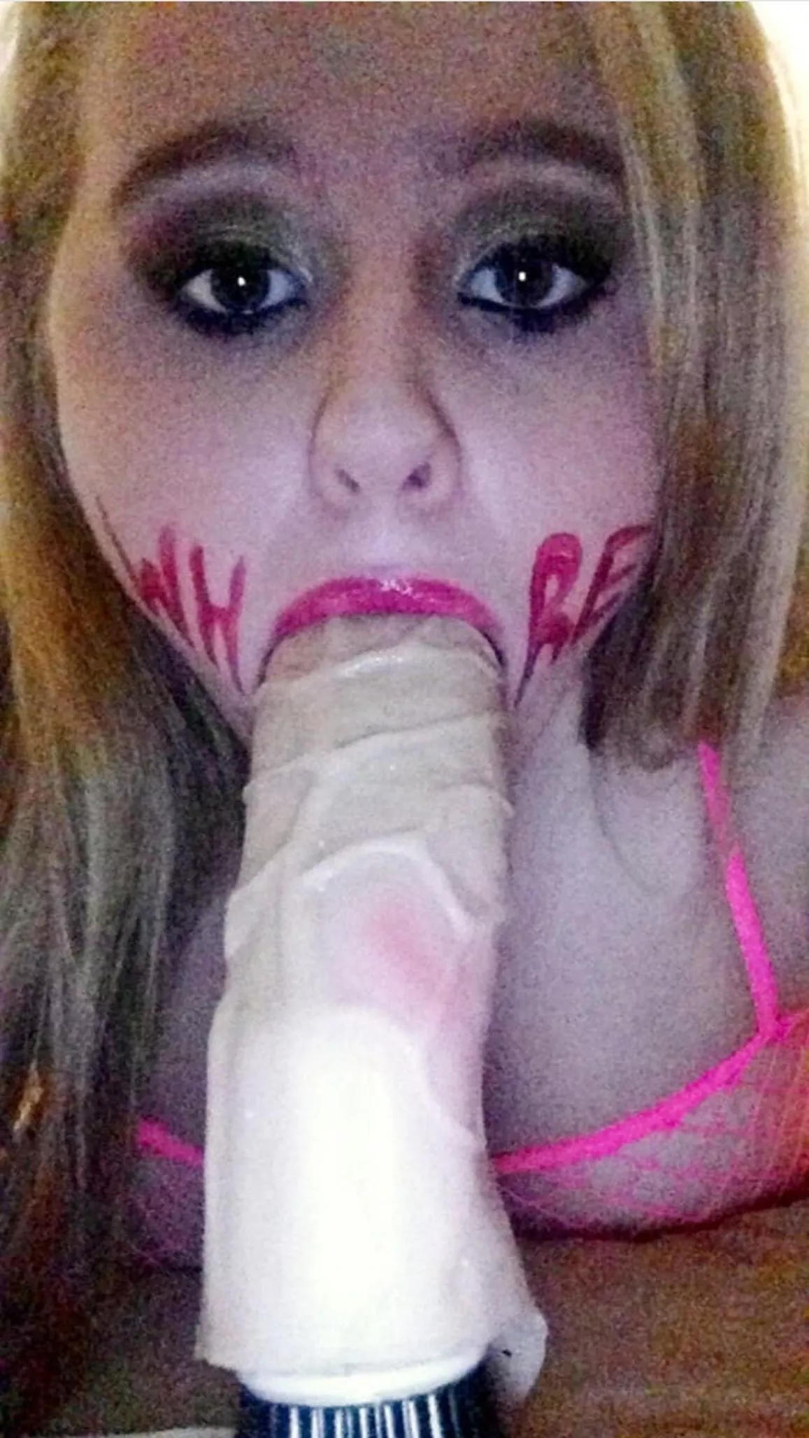 deeply conditioned to be a cock toy and the lipstick is a trigger look how empty her eyes are