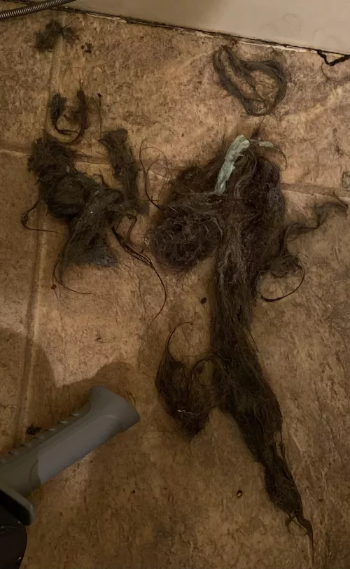 Drain was clogged, so I rage bought a drain auger and used all of the frustration in my 4’8” body to snake the drain myself. What came out was 6+ years of built up hair, soap scum, some sort of… gum? and plenty of weird grey juice (which some got i