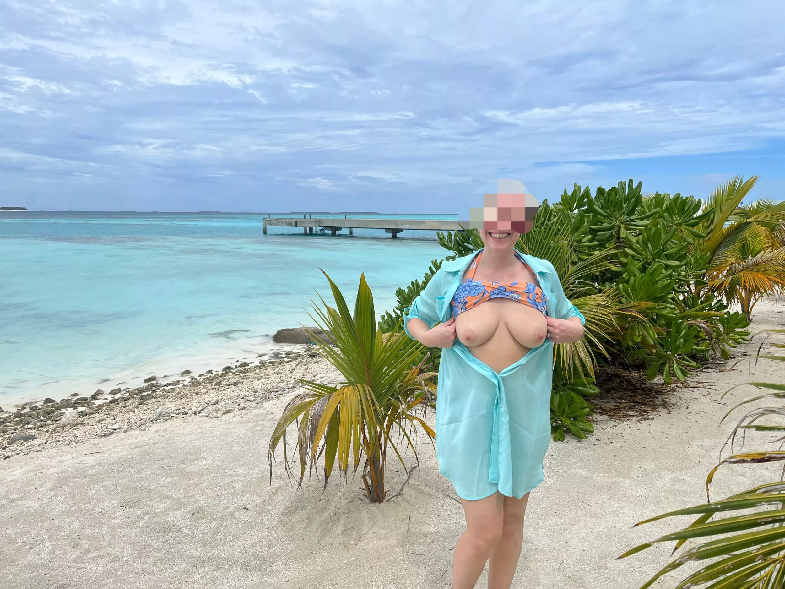 (f) Sea, sand and boob flashing fun