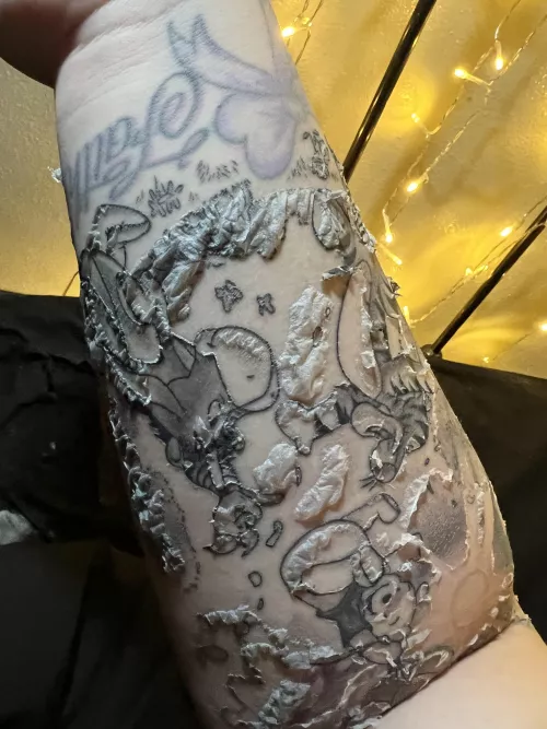 Forbidden pops! My tattoo is in the peeling stages. Got out of the shower and it looks like a bunch of empty blister pockets.