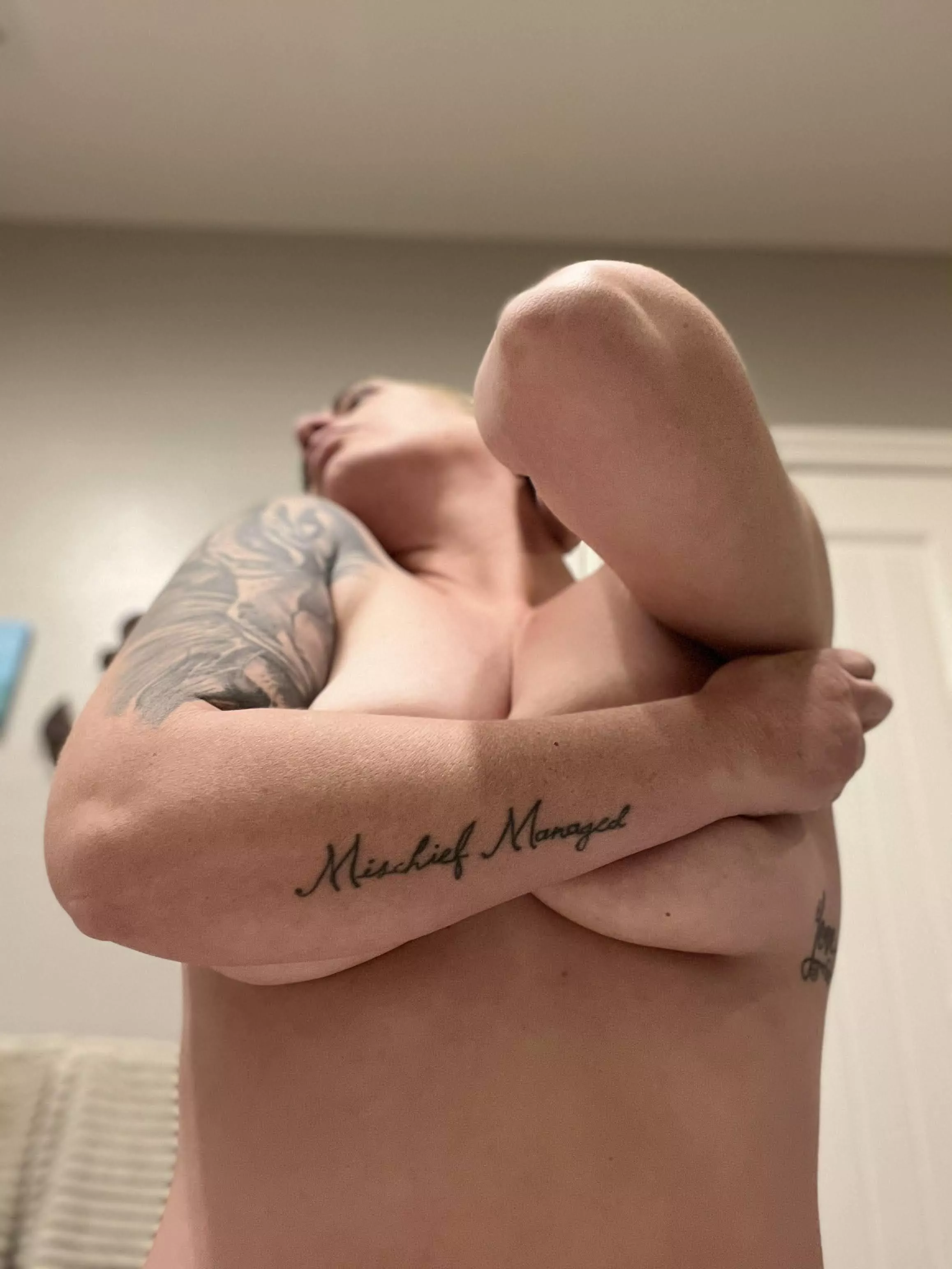 In the shower I do this so that when the water hits my boobs and arm it makes a waterfall… in case you wonder what women do in the shower.