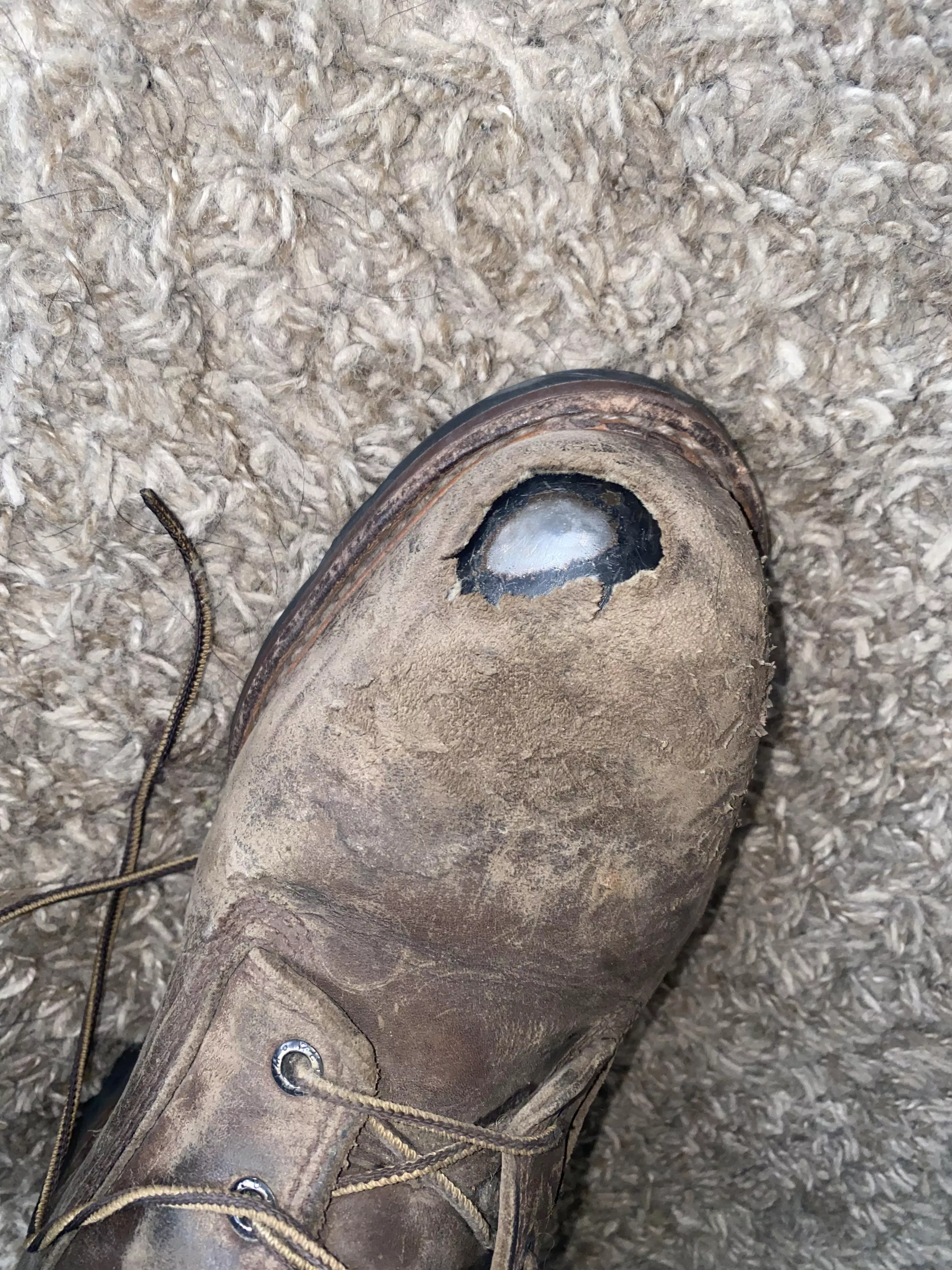 Is this fixable? Perfectly good boots I just don’t like how the steel shows. They are red wings Is this fixable? Perfectly good boots I just don’t like how the steel shows. They are red wings