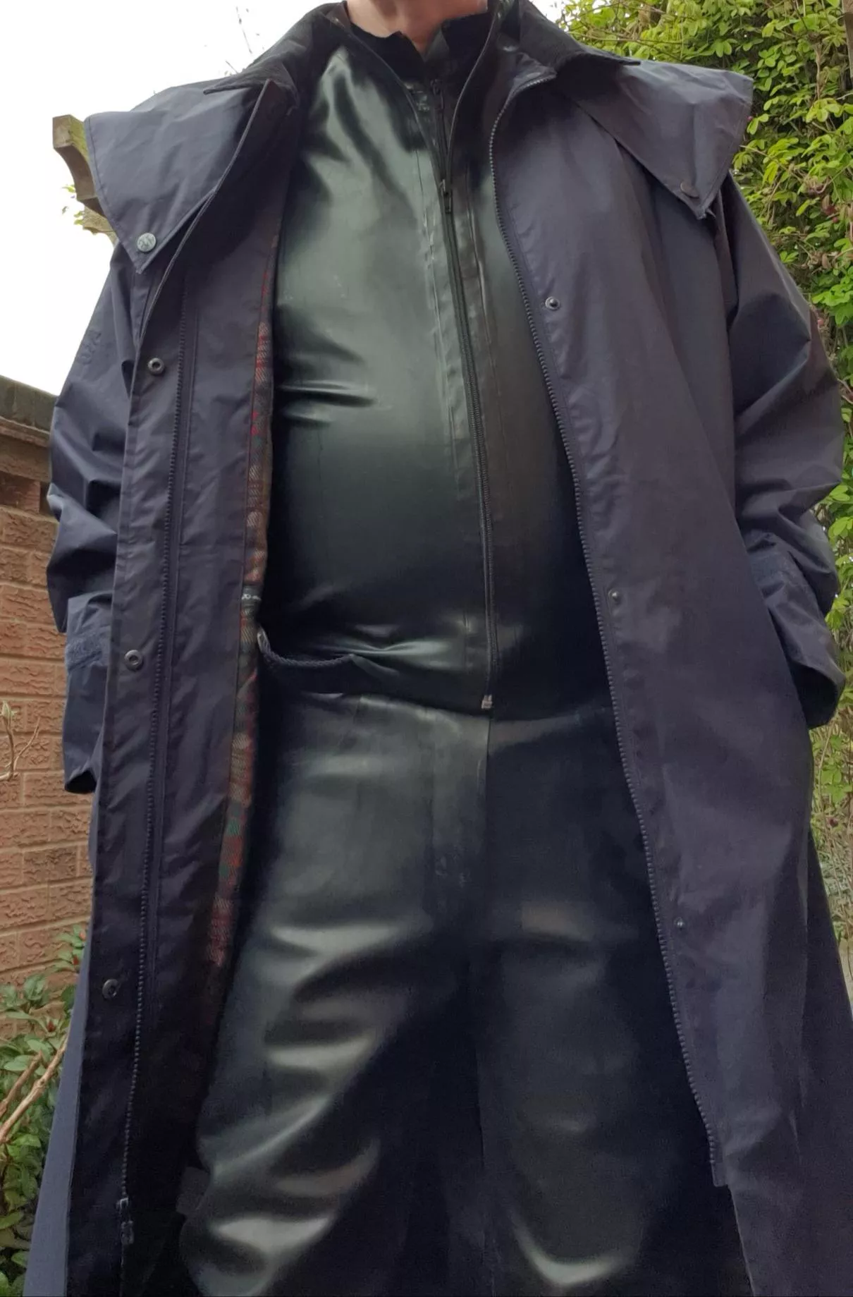 It's wet today, so long mac required. Plus an extra waterproof layer.