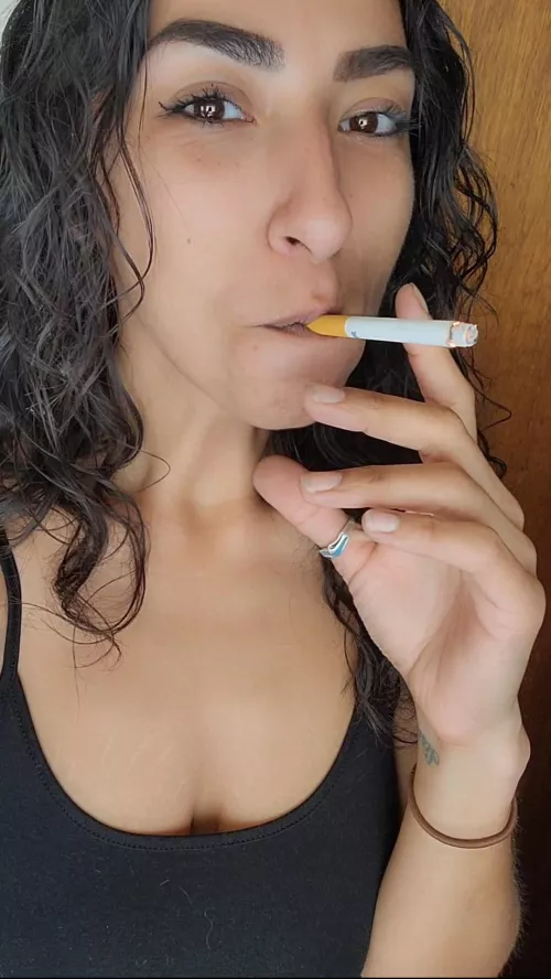 just a goddess and her smoke 😌💨
