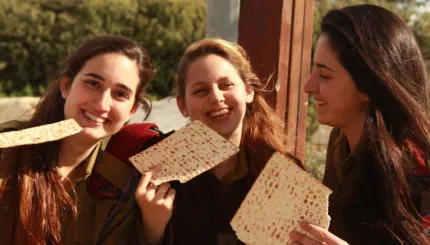 Matzah-eating IDF women. Happy Pesach!