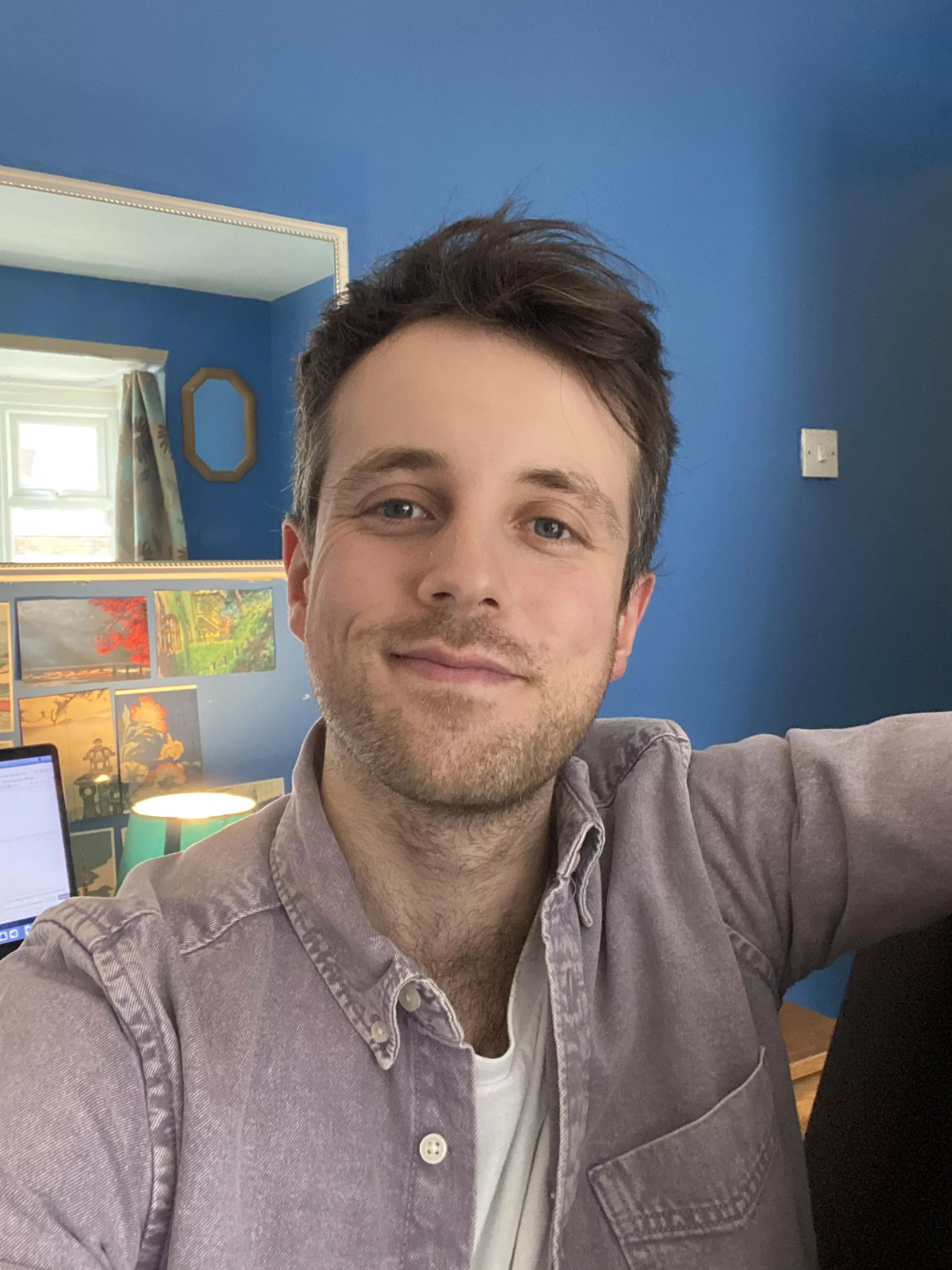 My face feat. Studio Ghibli postcards & aggressively blue wall