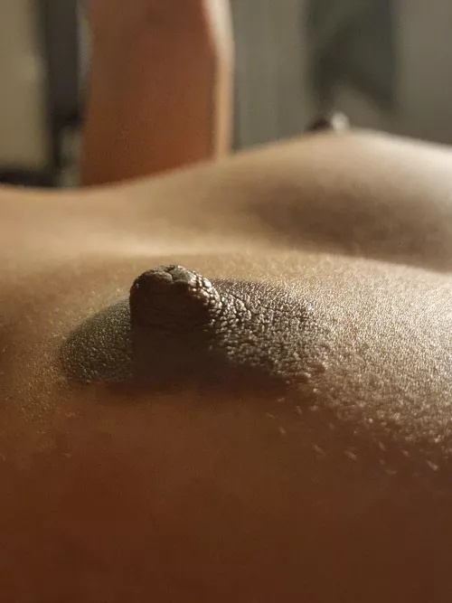 My girlfriend wants someone to help me attend to her nipples...any volunteers?
