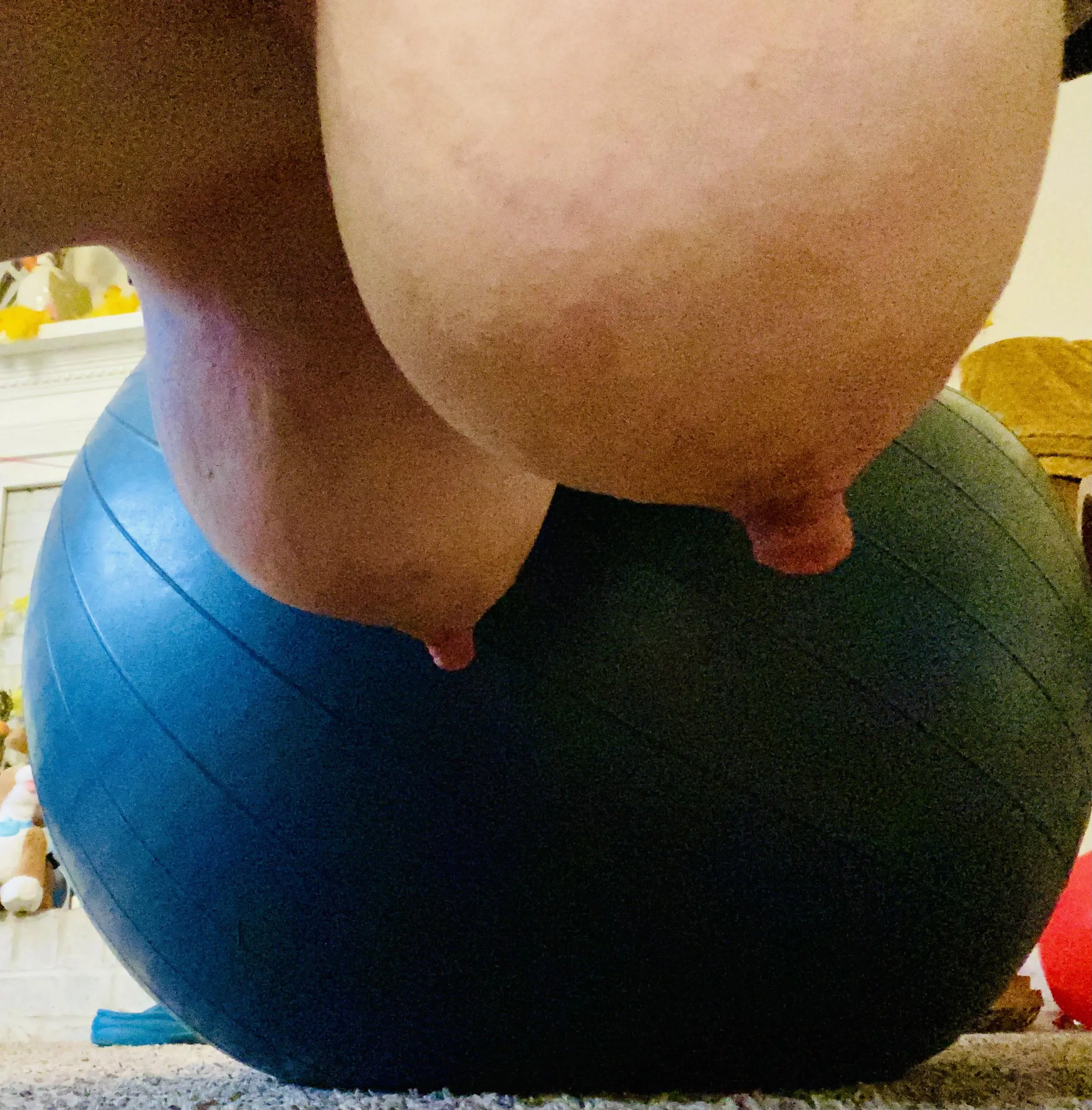 My kitty is rolling around with a medicine ball. I need to get some videos of this!