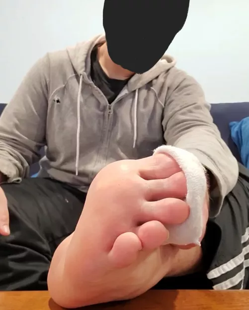 Peeling my sock off. releasing that foot scent 😏