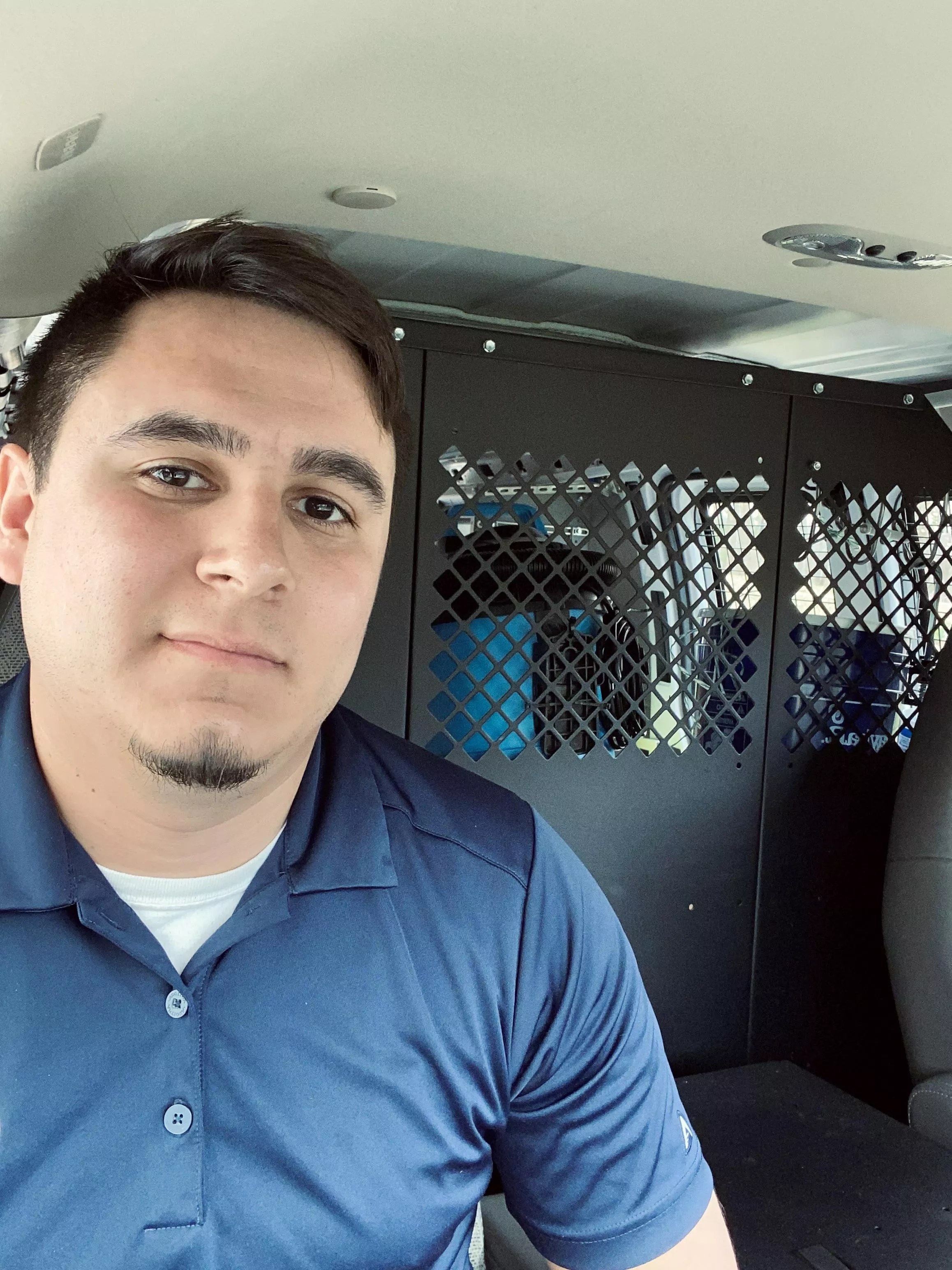 Post haircut in the work van