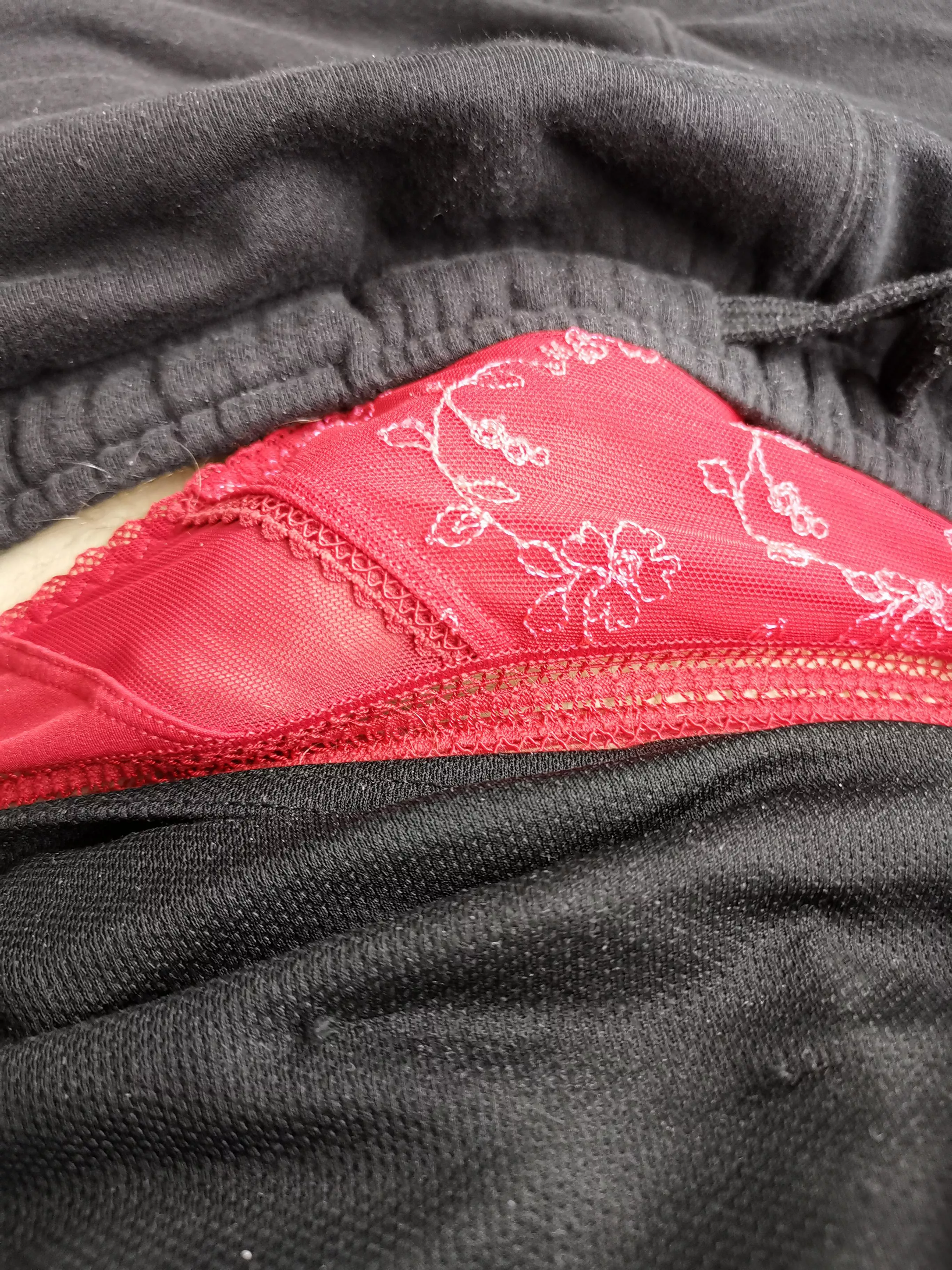 relaxing on the sofa, nice red thong for a Sunday