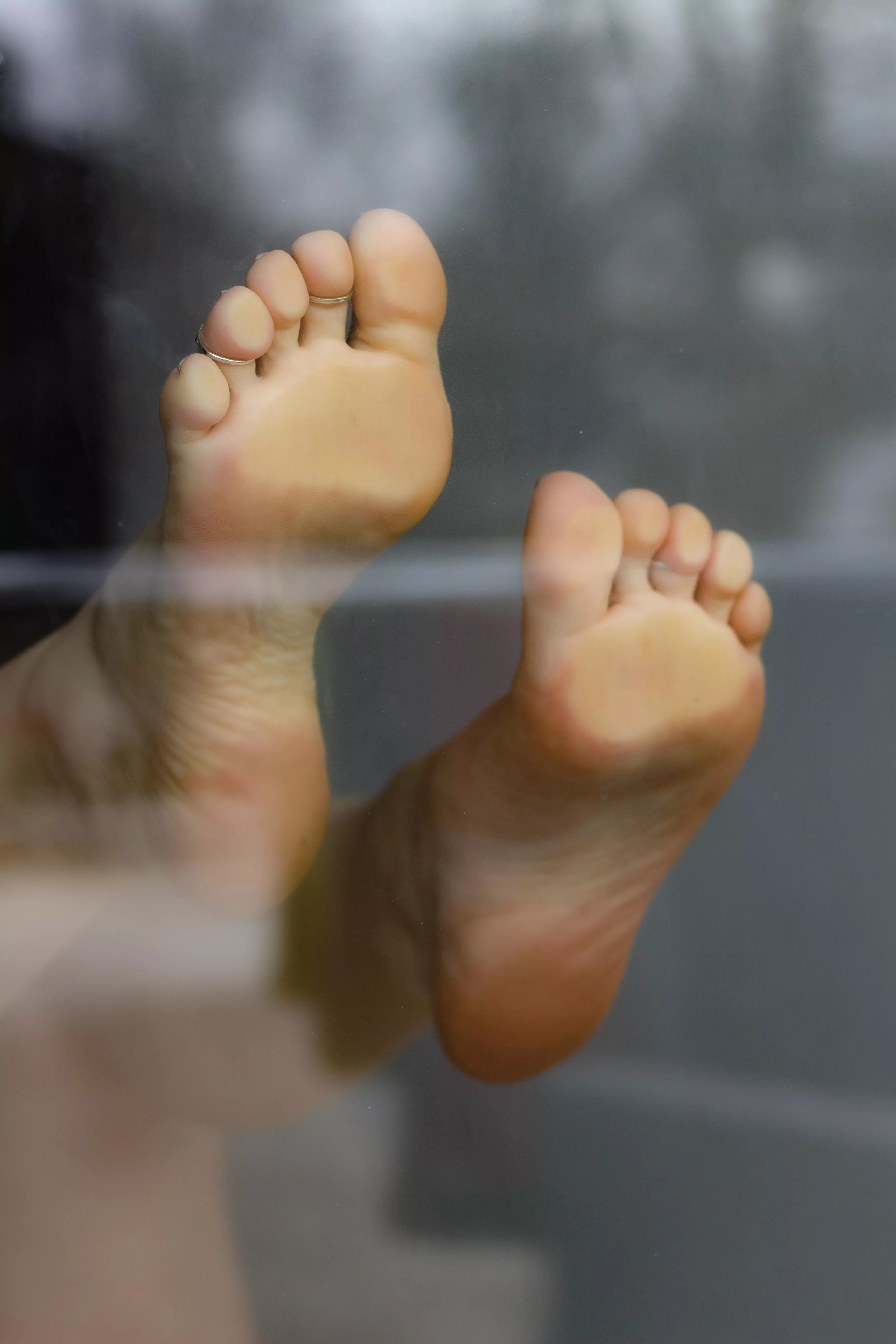 Soles on a window!