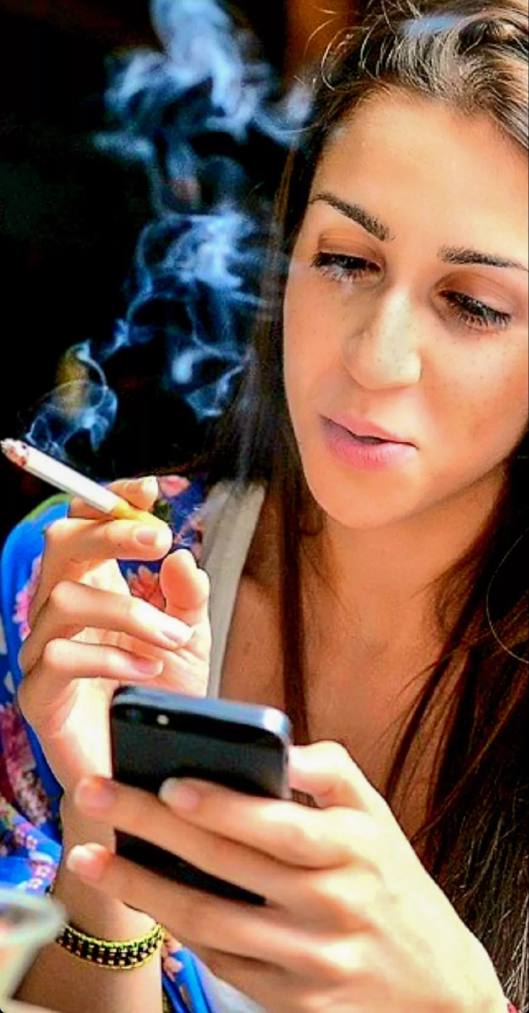 Summer is the time for outdoor smoking and texting