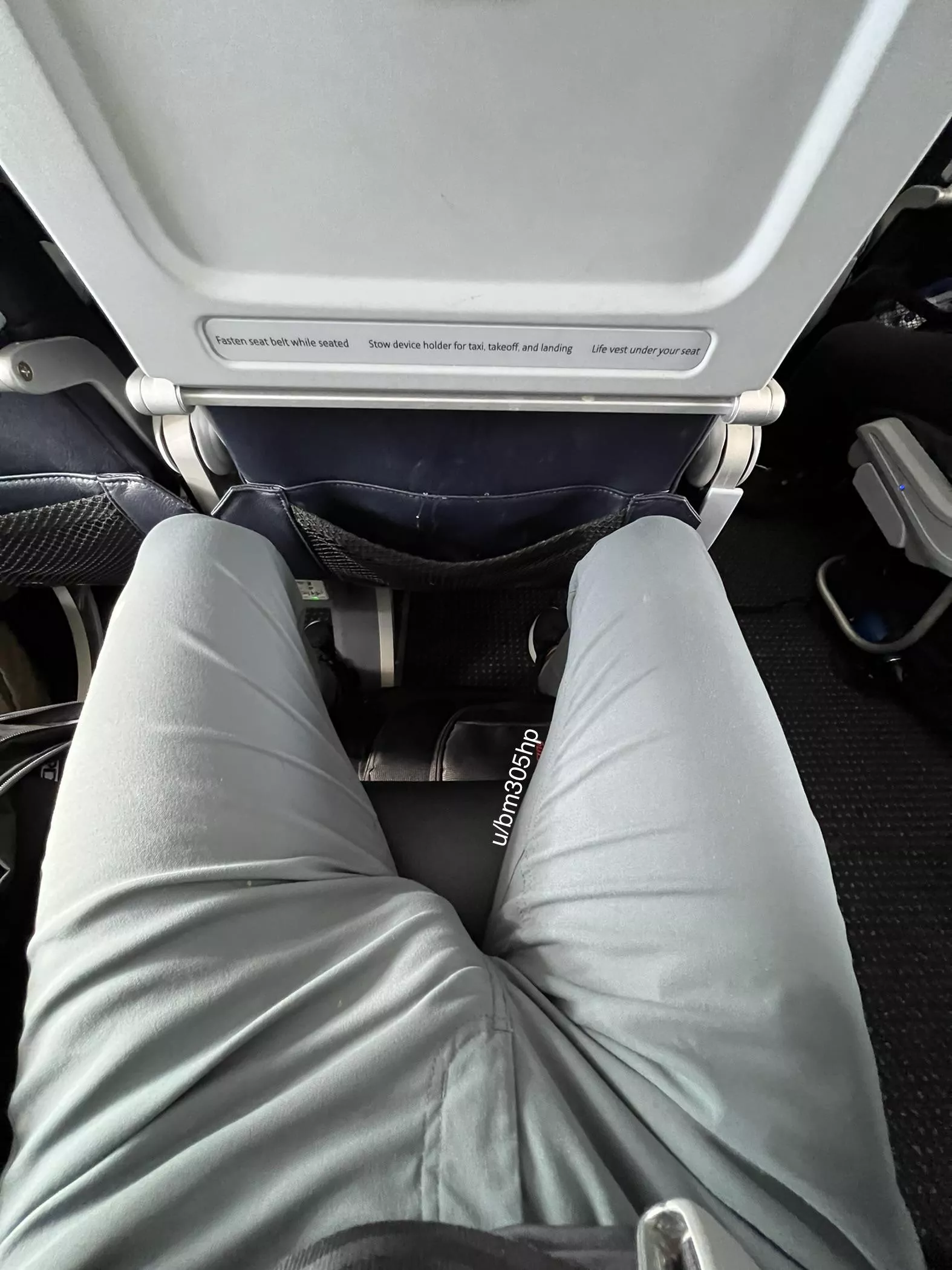 The flight attendant came by to check if my seat belt was fastened many times.