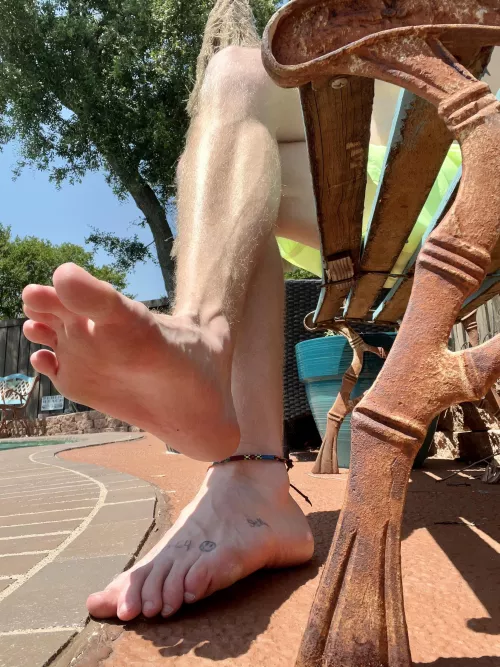 This photo is so powerful. Your view while you rub my feet and serve me drinks.