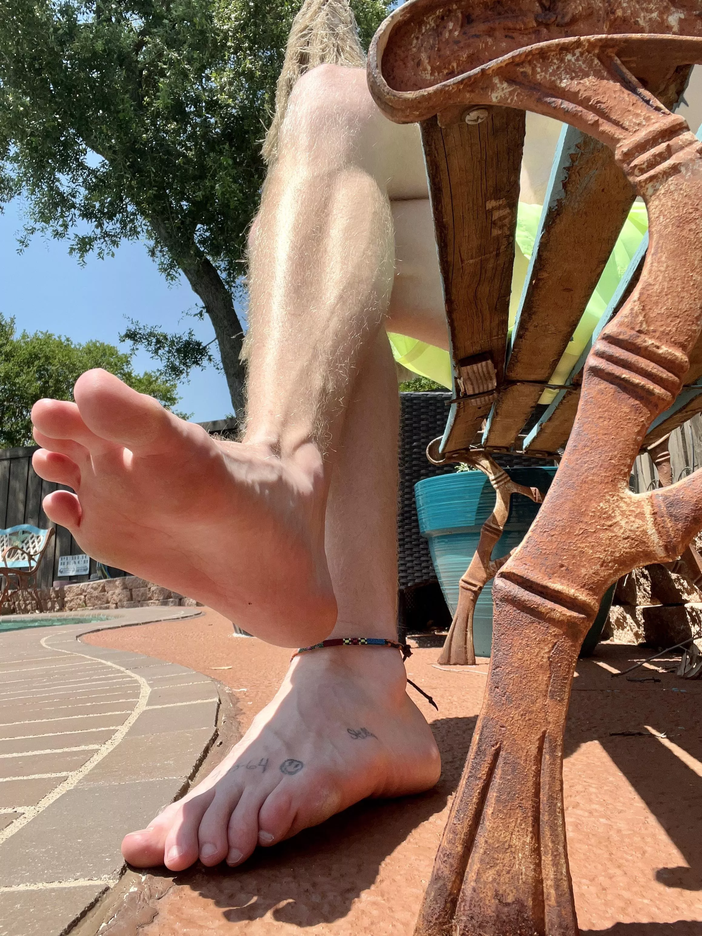 This photo is so powerful. Your view while you rub my feet and serve me drinks.