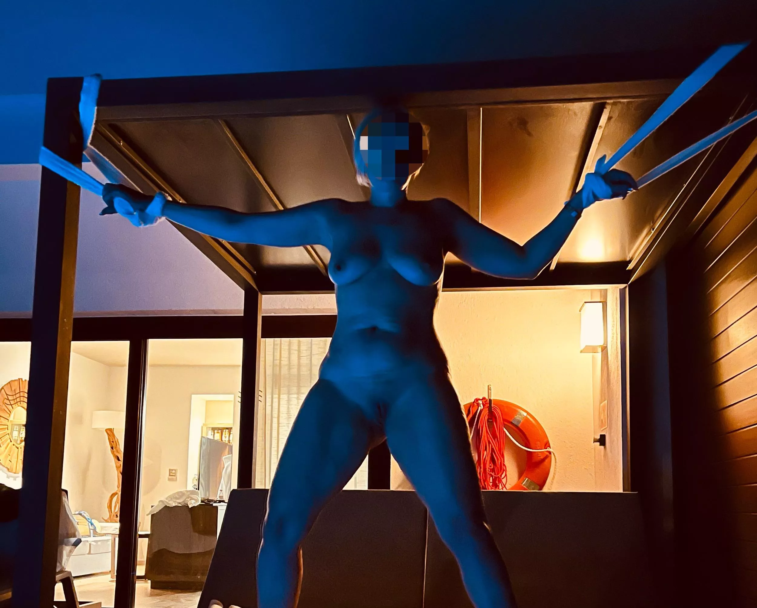 Tied to the day bed over the ocean with whatever I could find, on show to the evenings passing boats