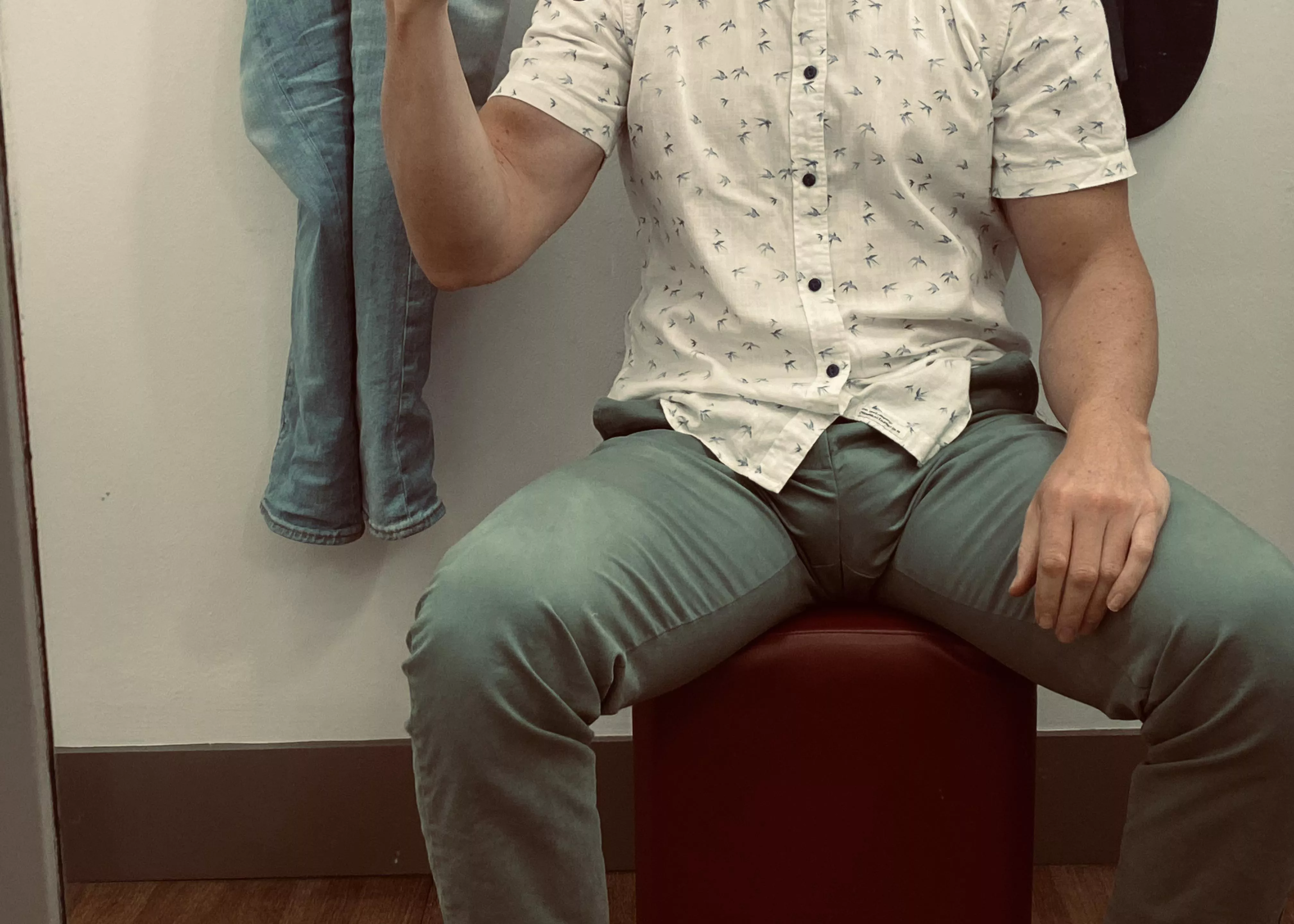 Trying on a new pair of chinos in the shop. Do you like the fit?