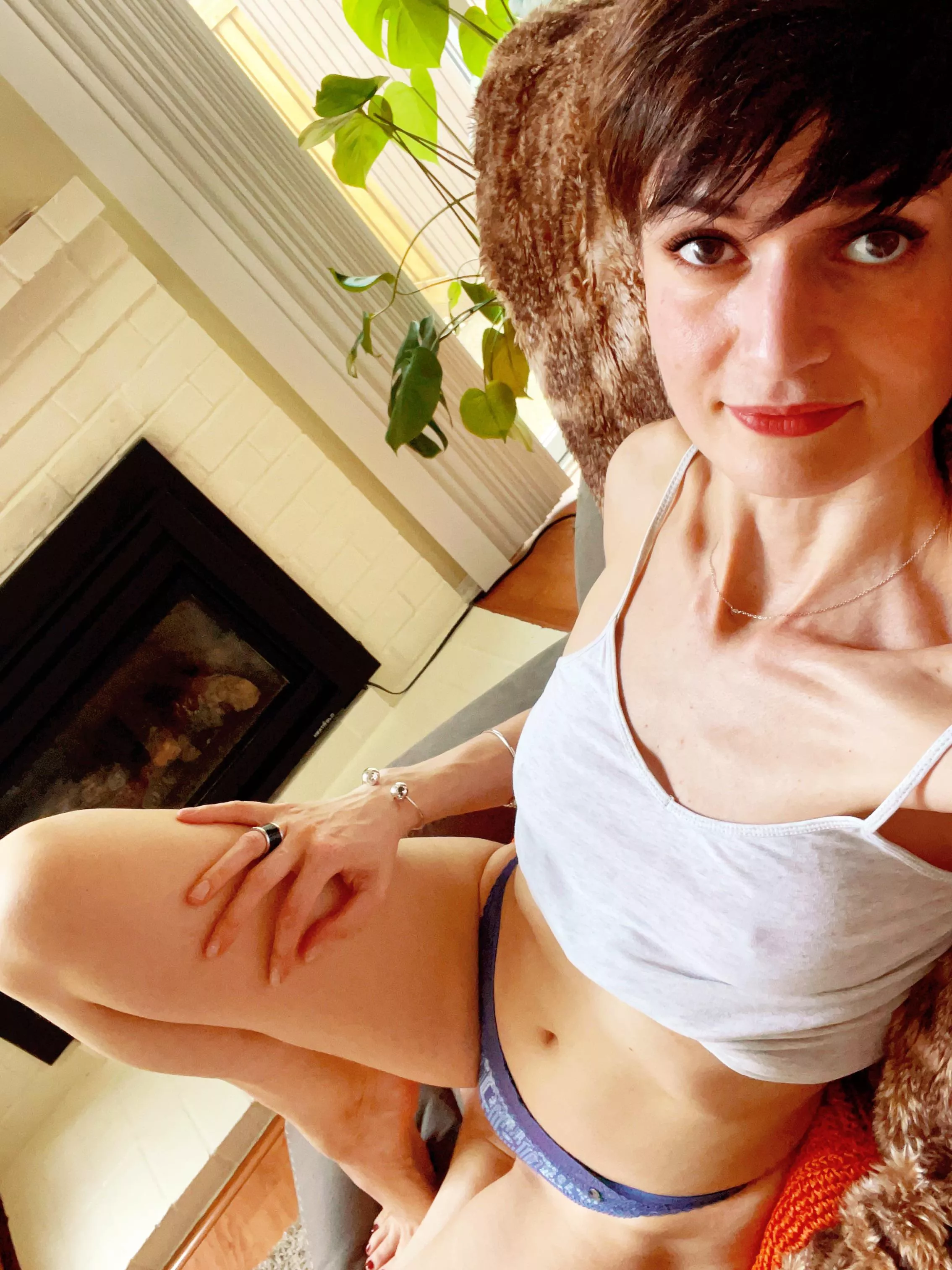 Want to join this cougar by the fireplace?[f38]