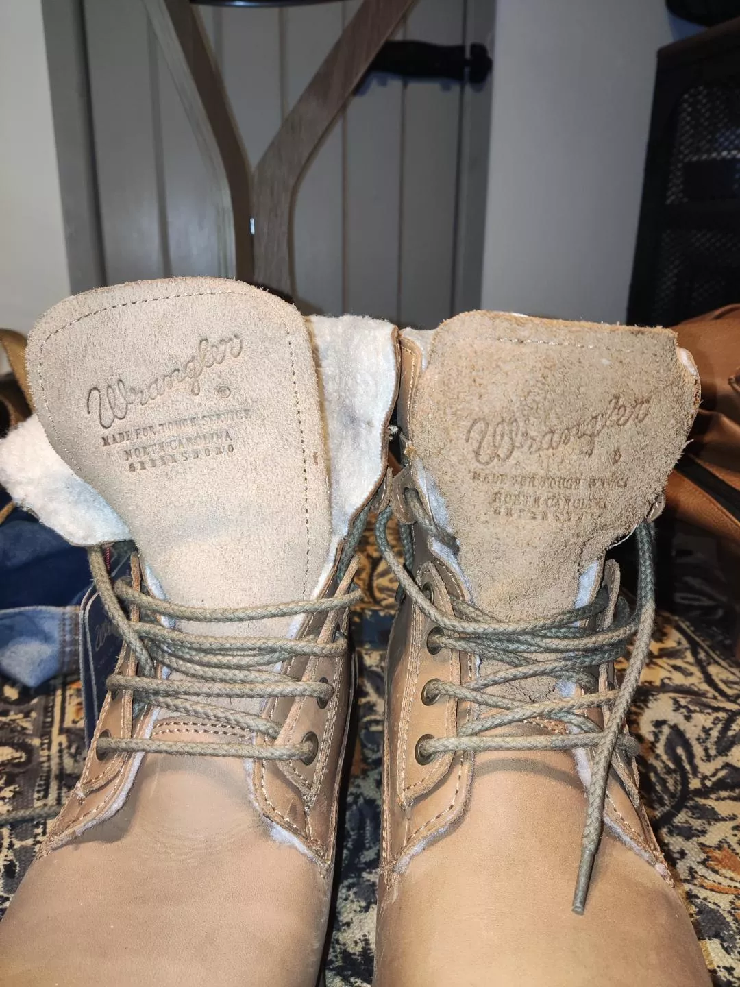 what's wrong with the boot on the right? the material looks strange what's wrong with the boot on the right? the material looks strange