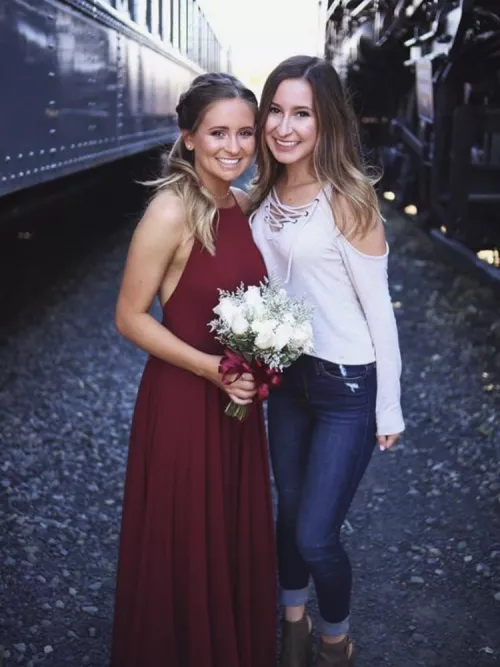 Which sister is getting railed in the men’s room at prom? [2]