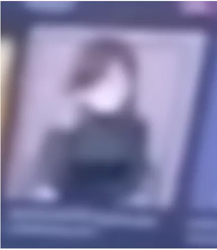 LF Color Source Black Sweater, Brown Hair, Turtleneck Sweater, Hair towards the left, hand fixing hair over-ear, hand crossing over chest