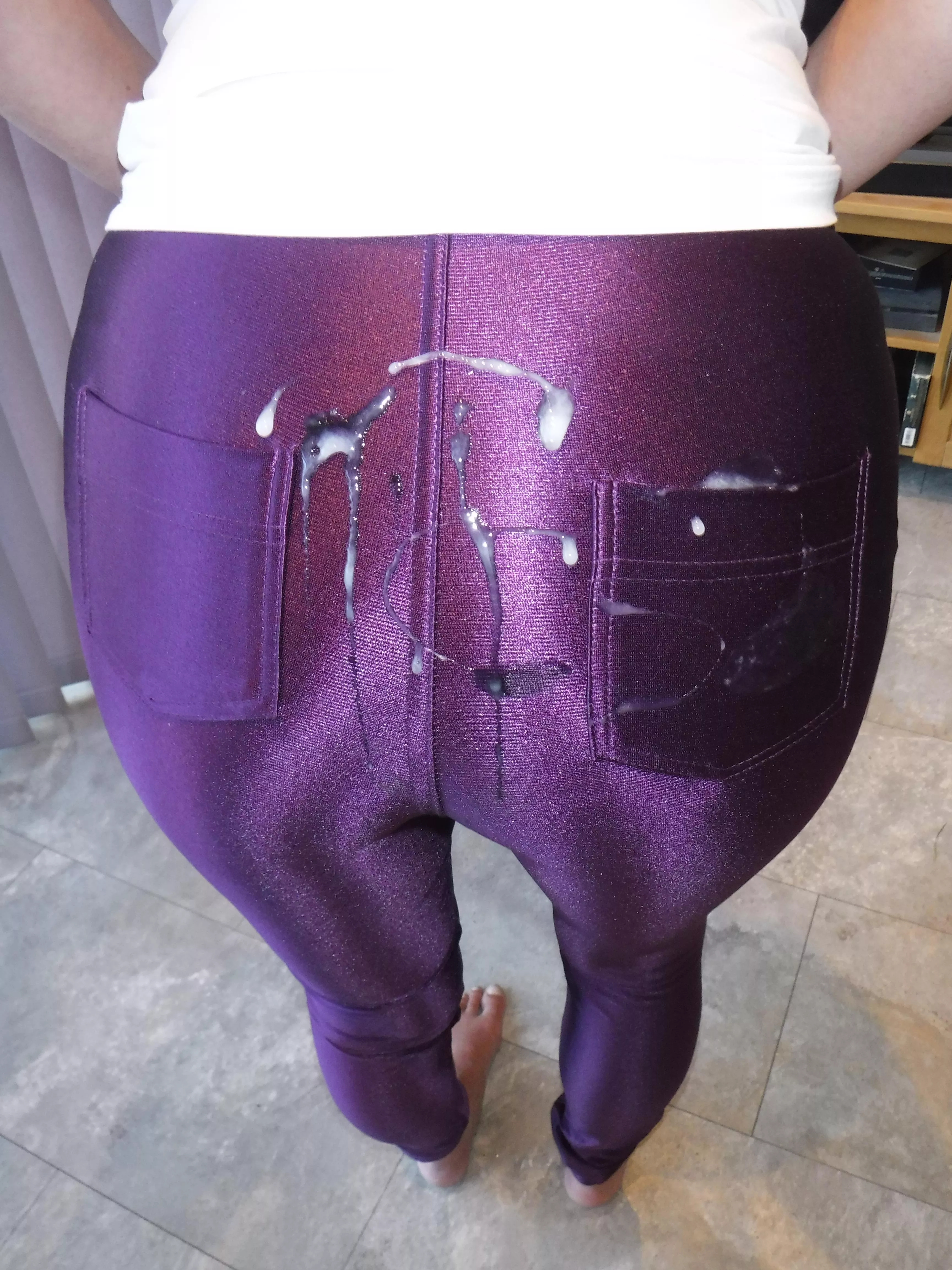 Shiny purple disco pants - most of the cum slide right off!