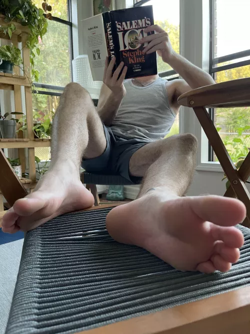 Taking in the finer things in life. Like you worshipping my feet. [22]