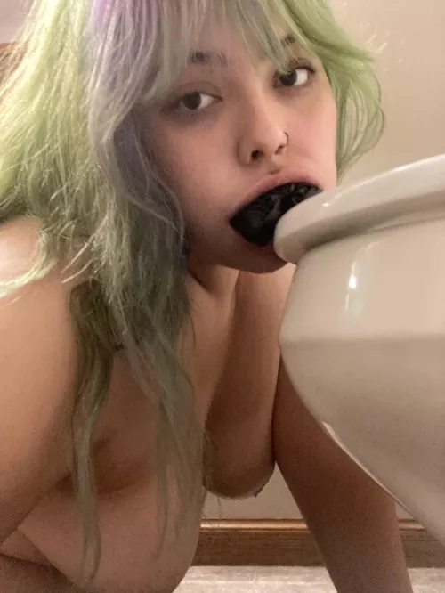 Making her kiss the toilet with her panties in her mouth