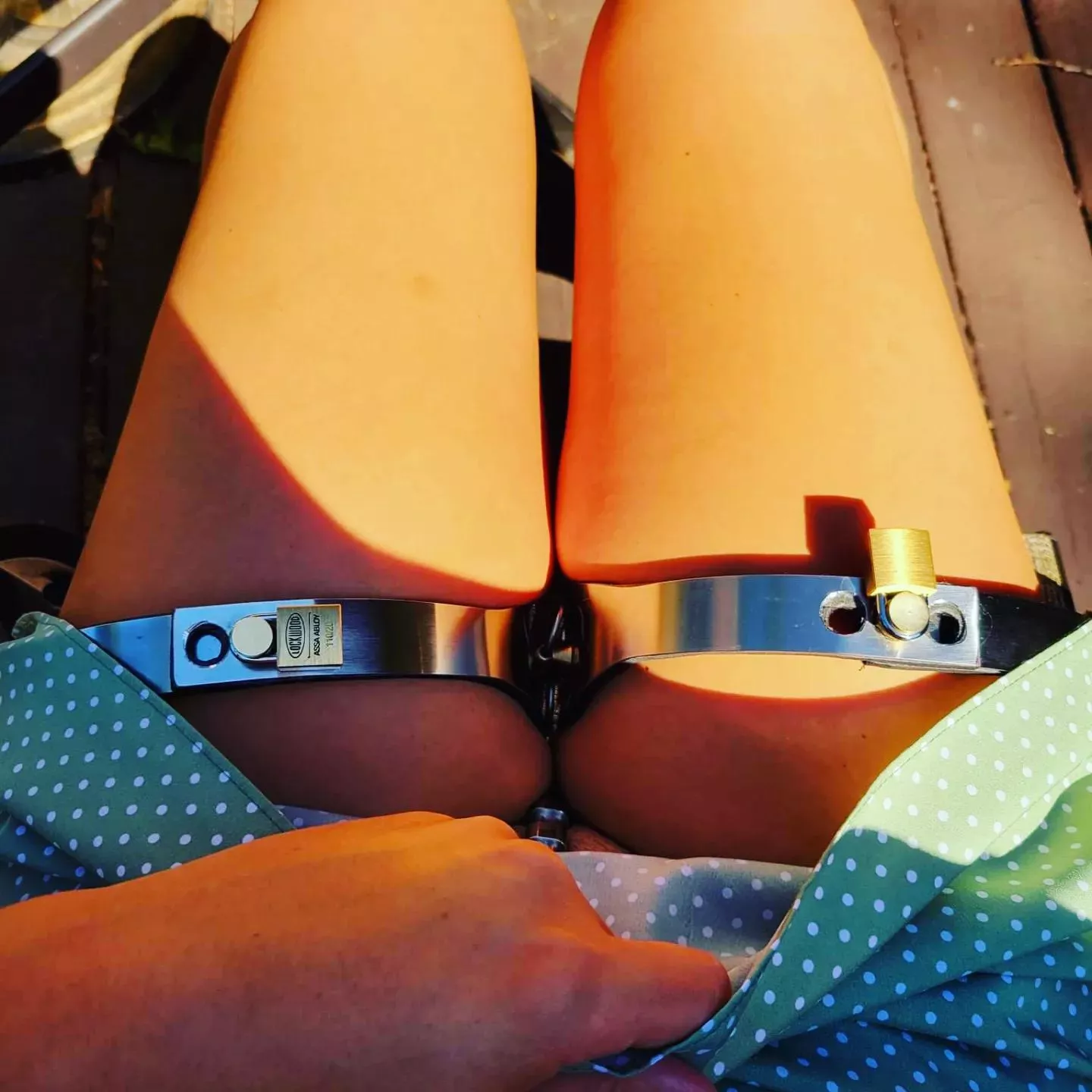 Getting some sun in my chastity. Hopefully the neighbors don't notice 🫢