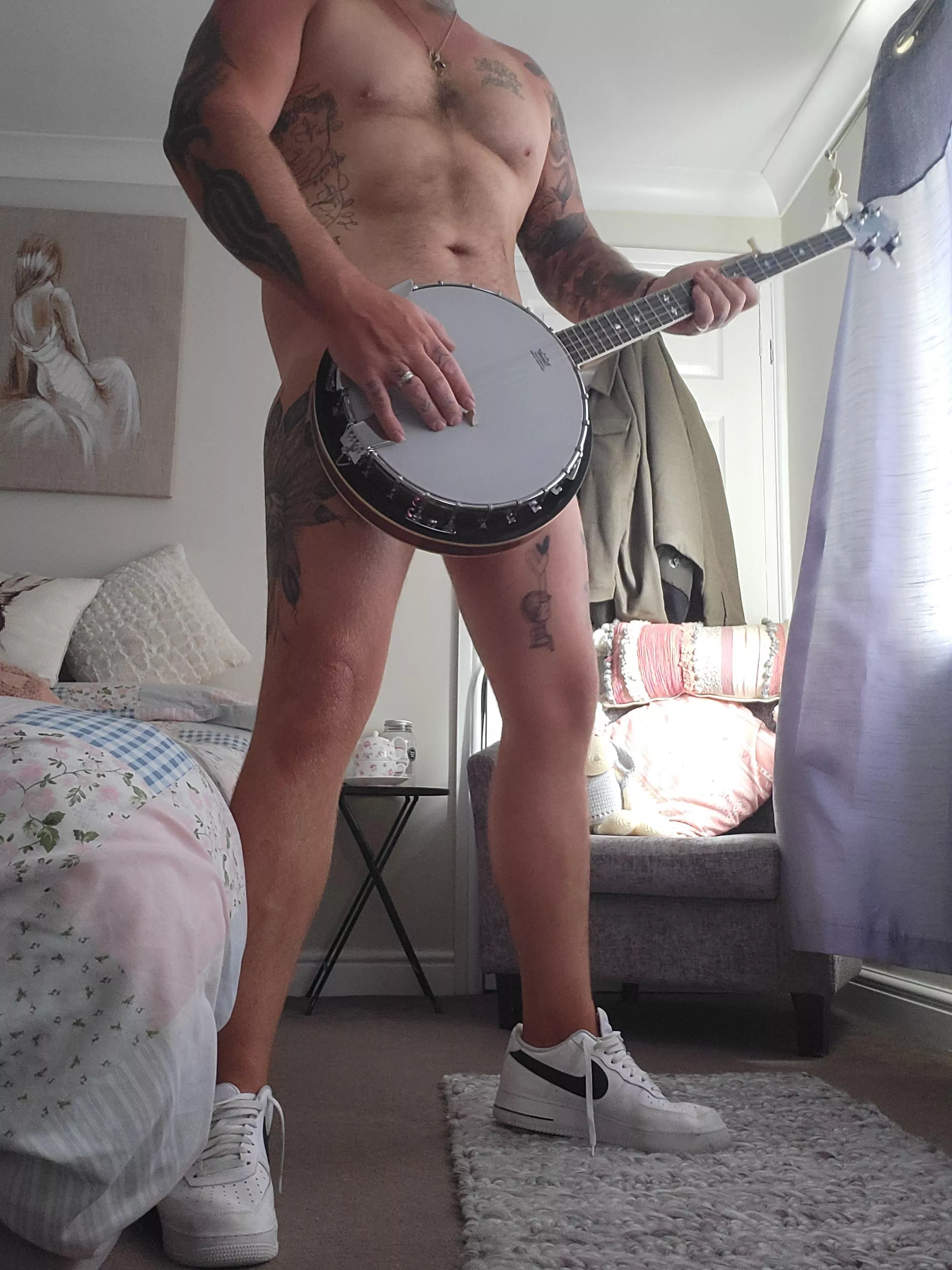 tattooed banjo player ?