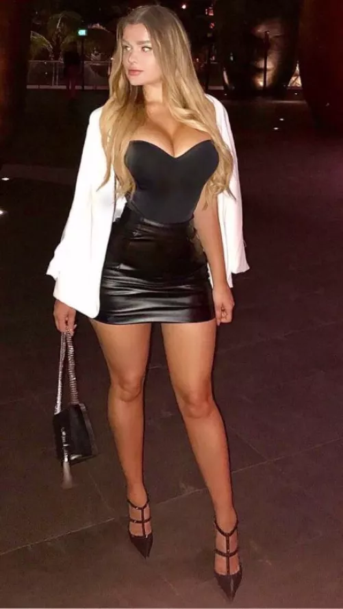 Magnificent curves in black mini and bodysuit