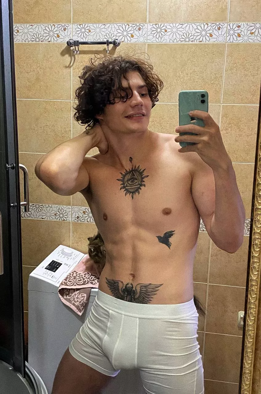 I'm covering my cat, because I'm wearing underpants, and he's wearing nothing at all