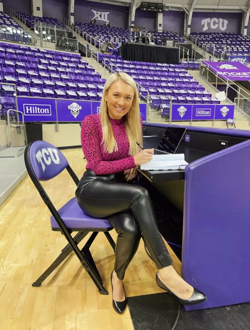 Keeping score of the game in her shiny pants