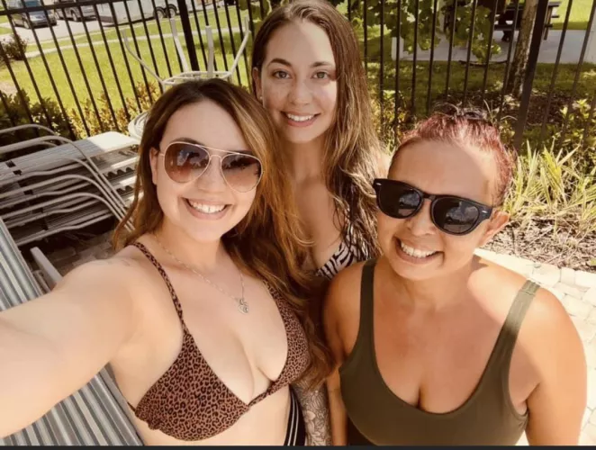 [3] a mom and her daughters. Who you filling up first?