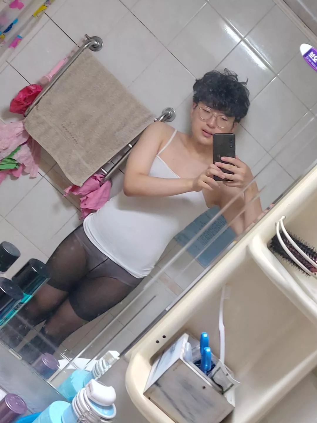 Feminine clothes are piling deeper and deeper into my closet.