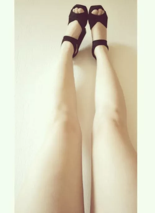 Heels on. Legs to the sky.