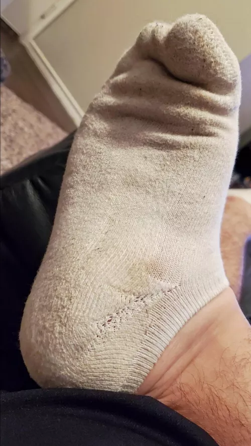 My dirty socked foot