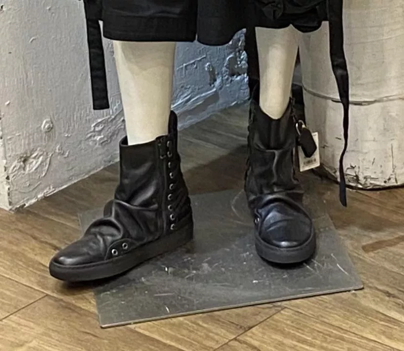 Could anyone help me identify these boots? Been looking for them for a while.