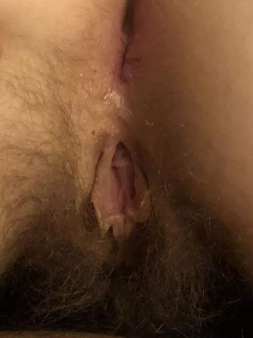 Shove your tongue in this hungry hairy pussy.