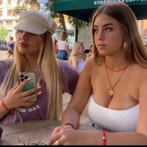 Both looking away triying to hide the obvius breast envy.