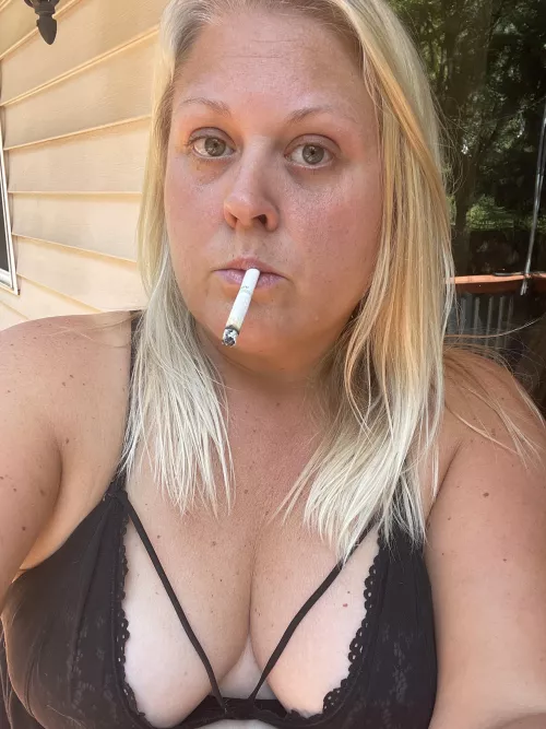 Dangling a Marlboro Light 100 menthol in my bra outdoors!