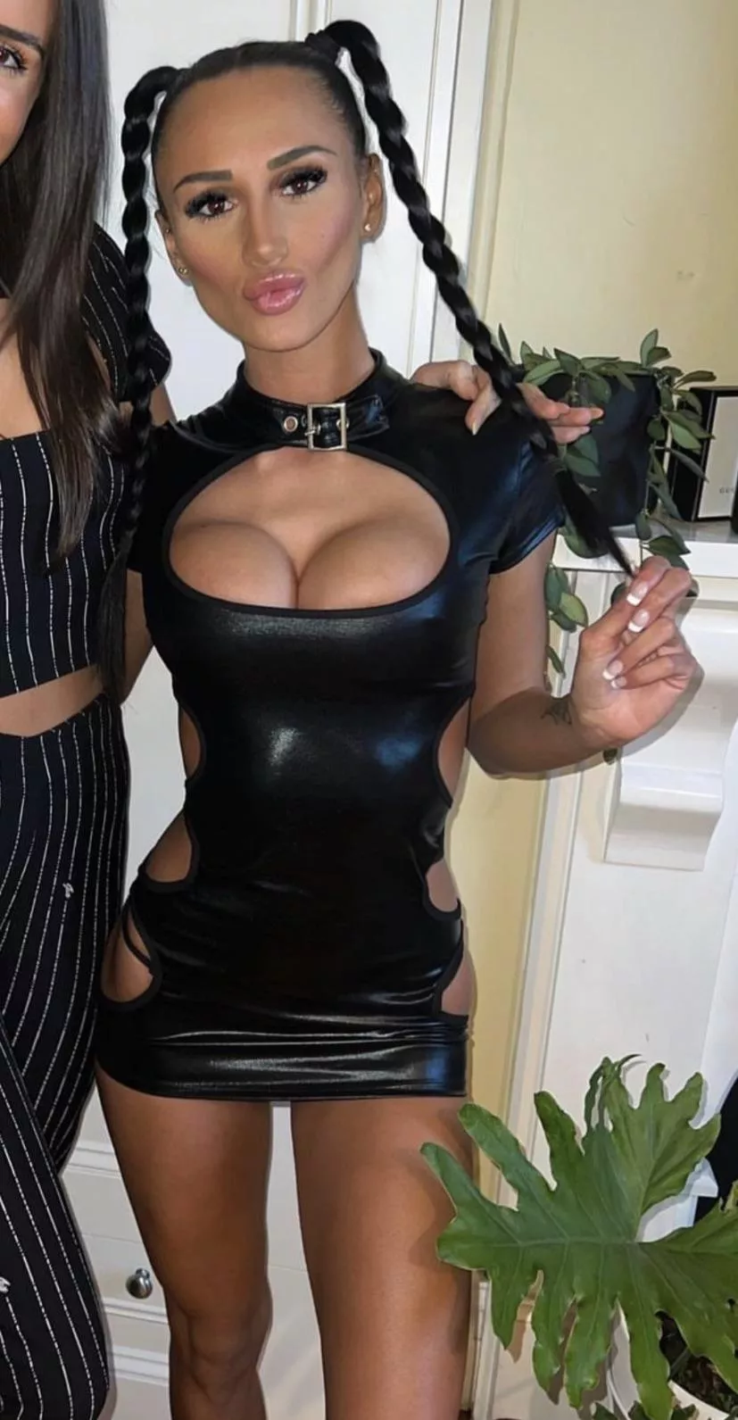 tits bursting out , leather dress , pigtails , she’s perfect