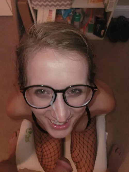 My young slut with a load on her face and tits.