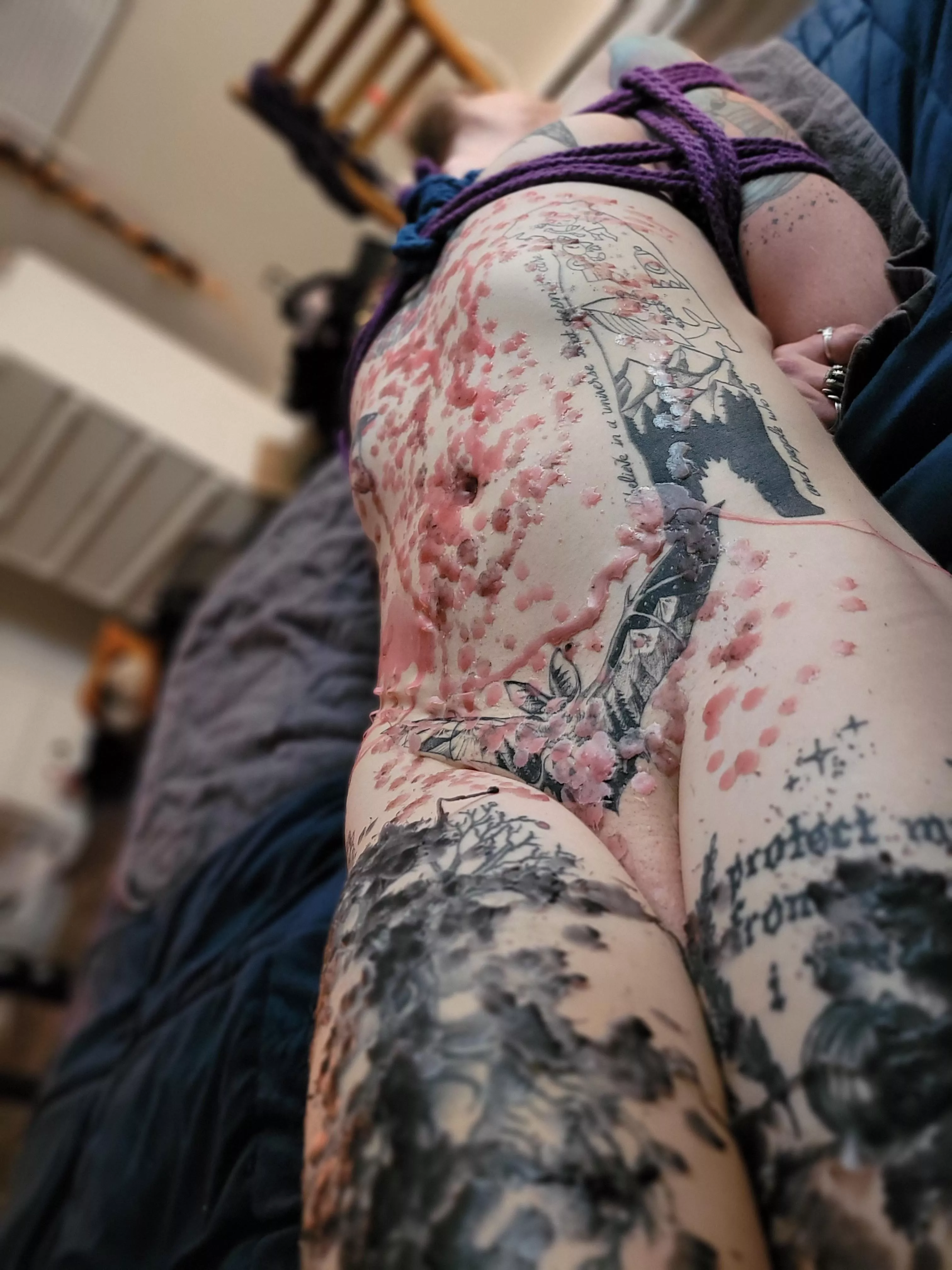 Can you even see my tattoos through all that wax?