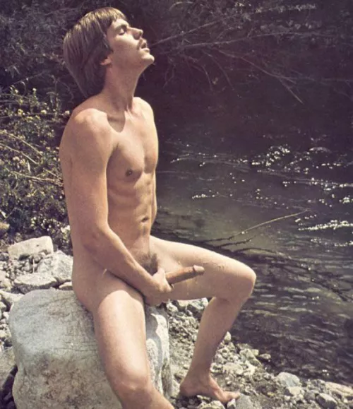 “Derrick Stanton strokes his cock by the river” …