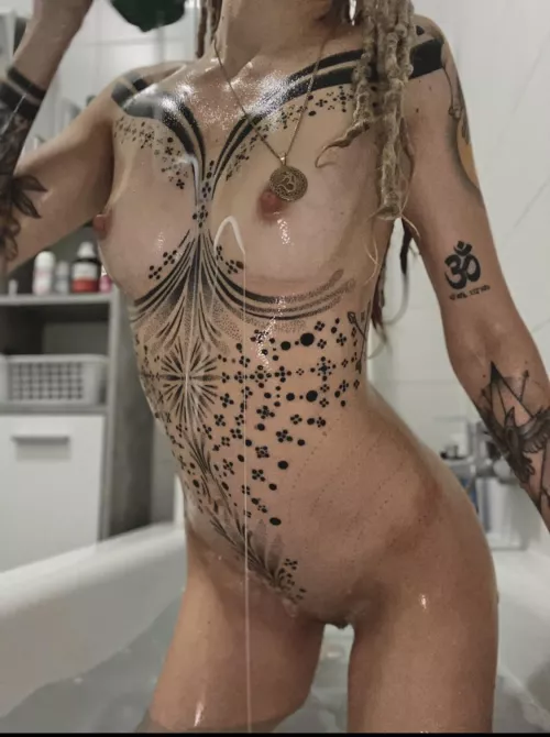 I love how the tattoo frames my body so perfectly